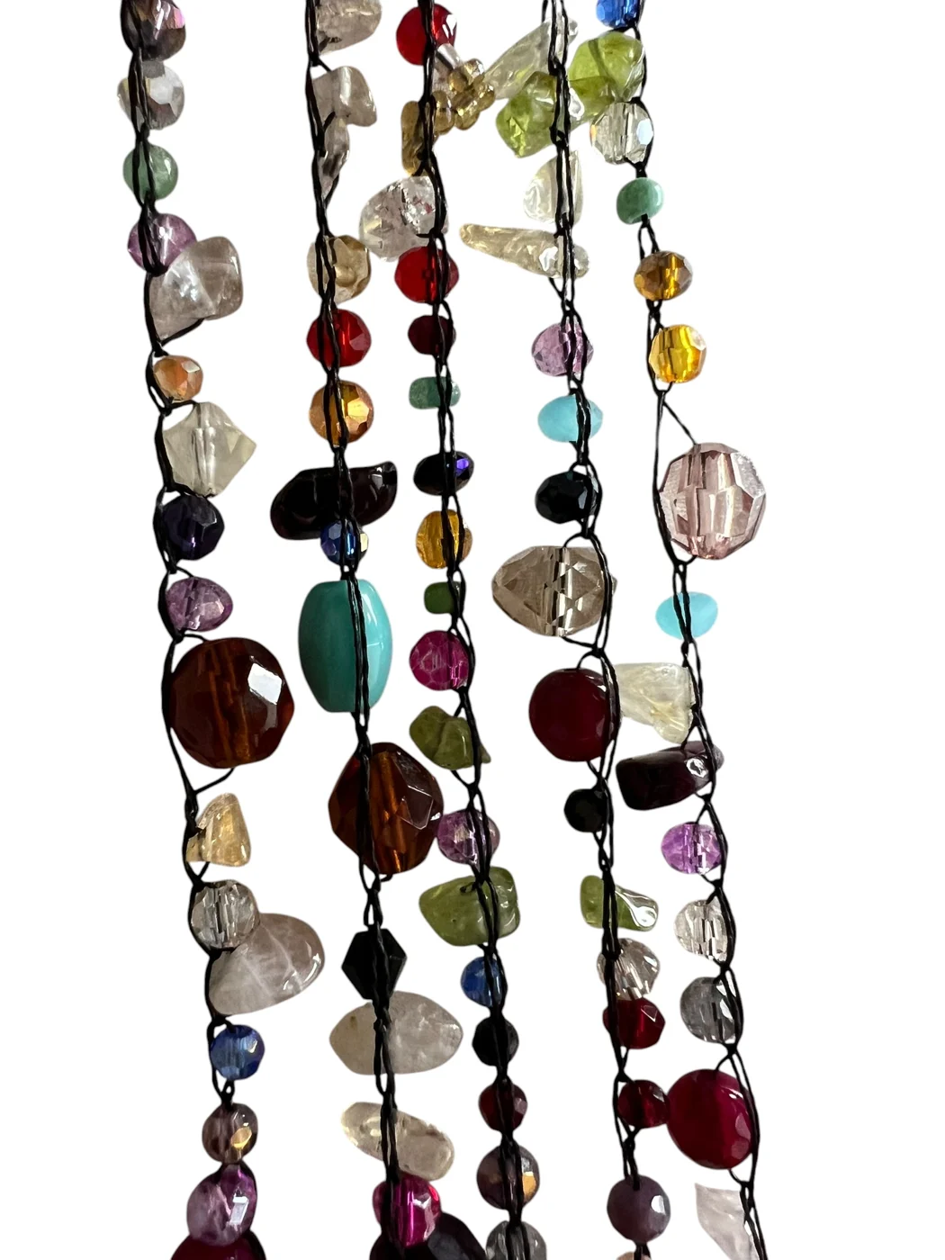 Hand-strung gemstone strands in jewel colours